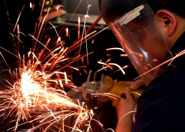 0420-1007-2016-4658_man_using_a_grinder_at_work_o.jpg