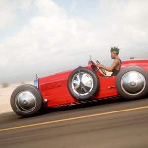 Vibing at 120MPH in a vintage Bugatti