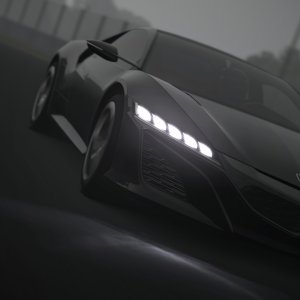 NSX Concept a reality in the dark Suzuka rain.