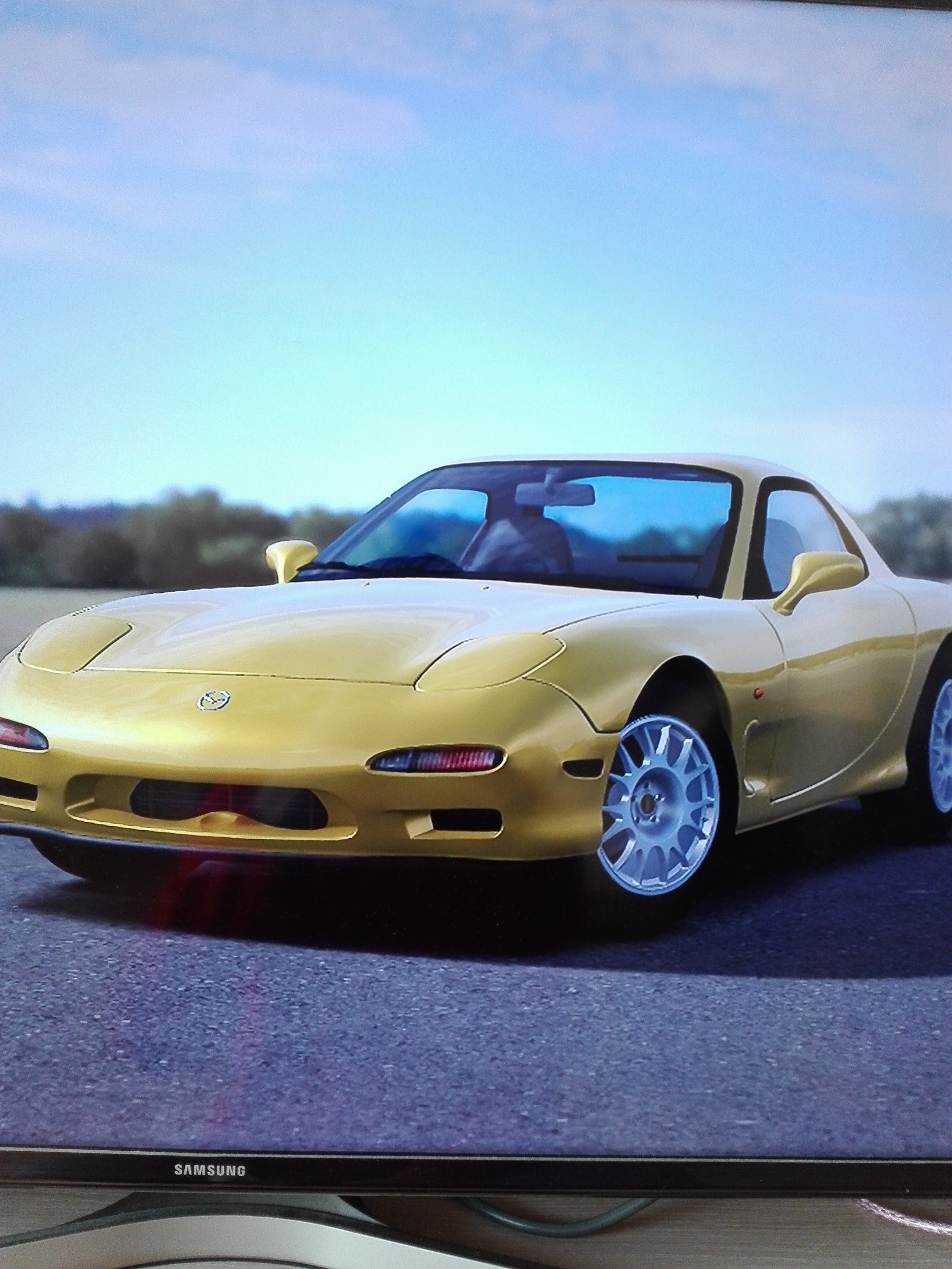 Mazda RX-7 Sunburst Yellow