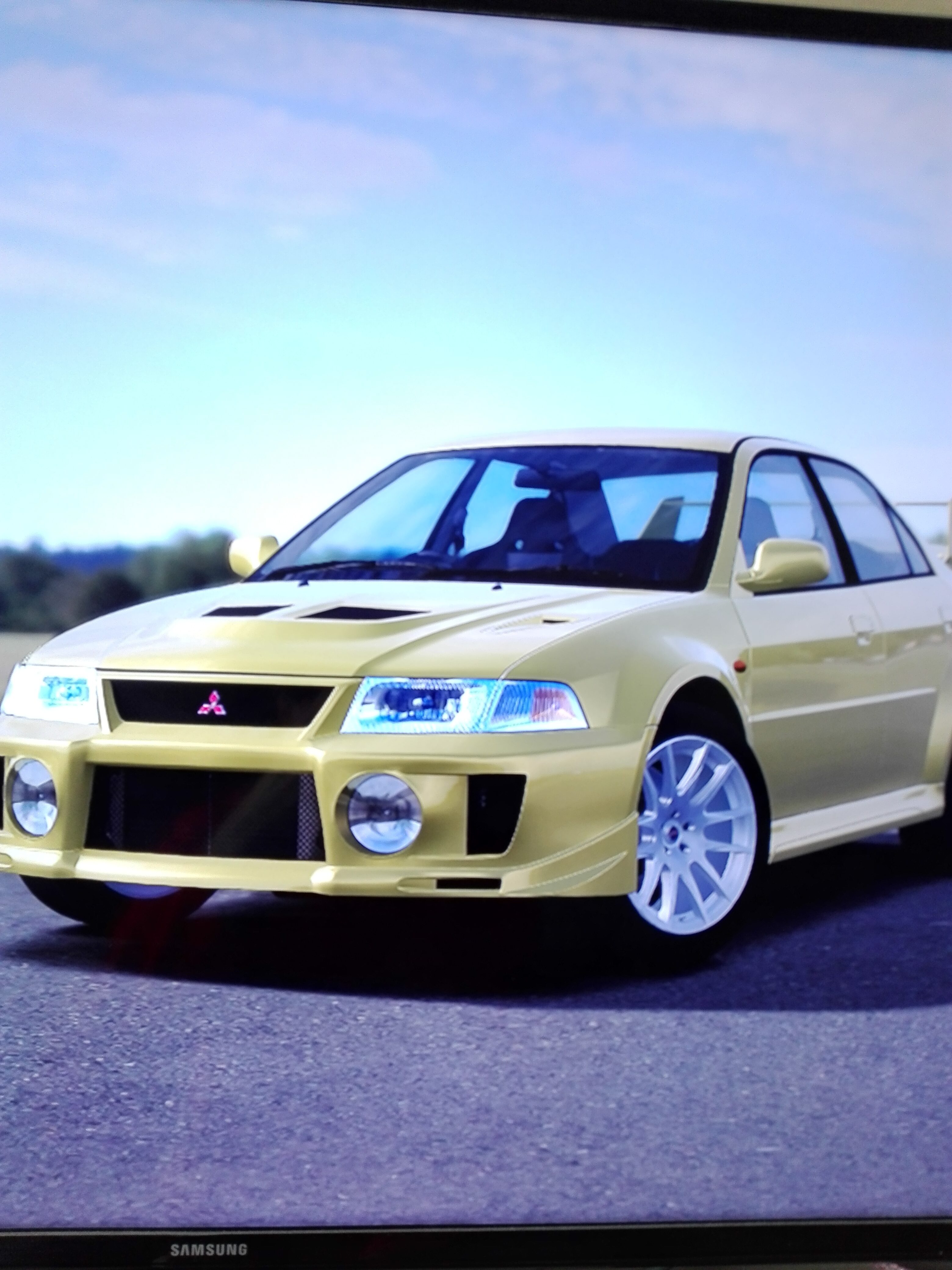 Mitsubishi Lancer Evolution IV Dandelion Yellow