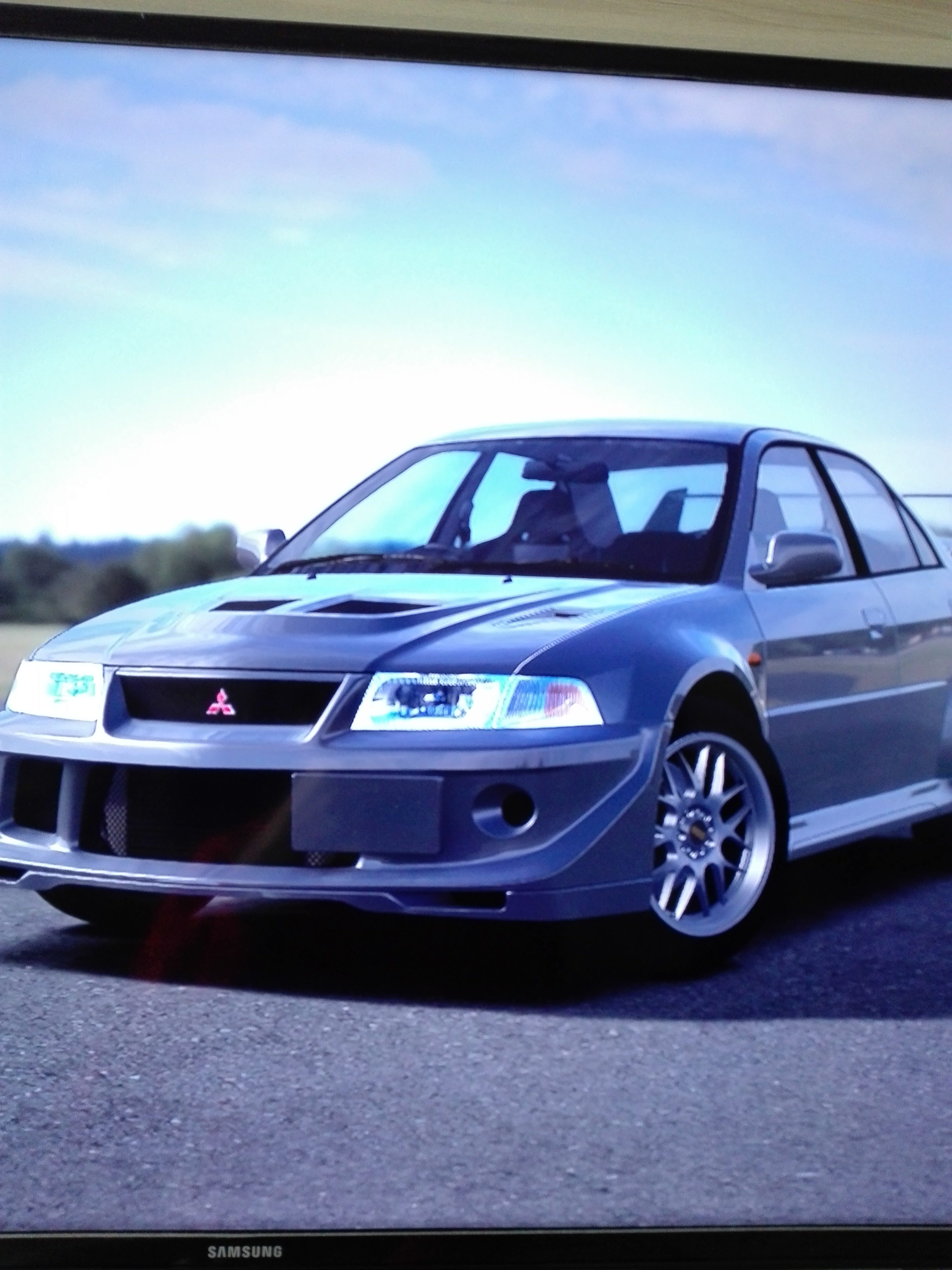 Mitsubishi Lancer Evolution VI Champagne Gold