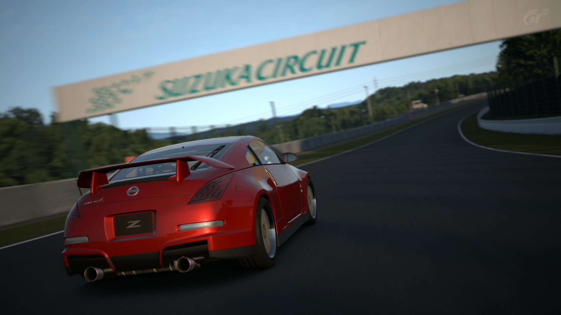 Opera Performance Gran Turismo Z putting down the metal at Suzuka's 200R.