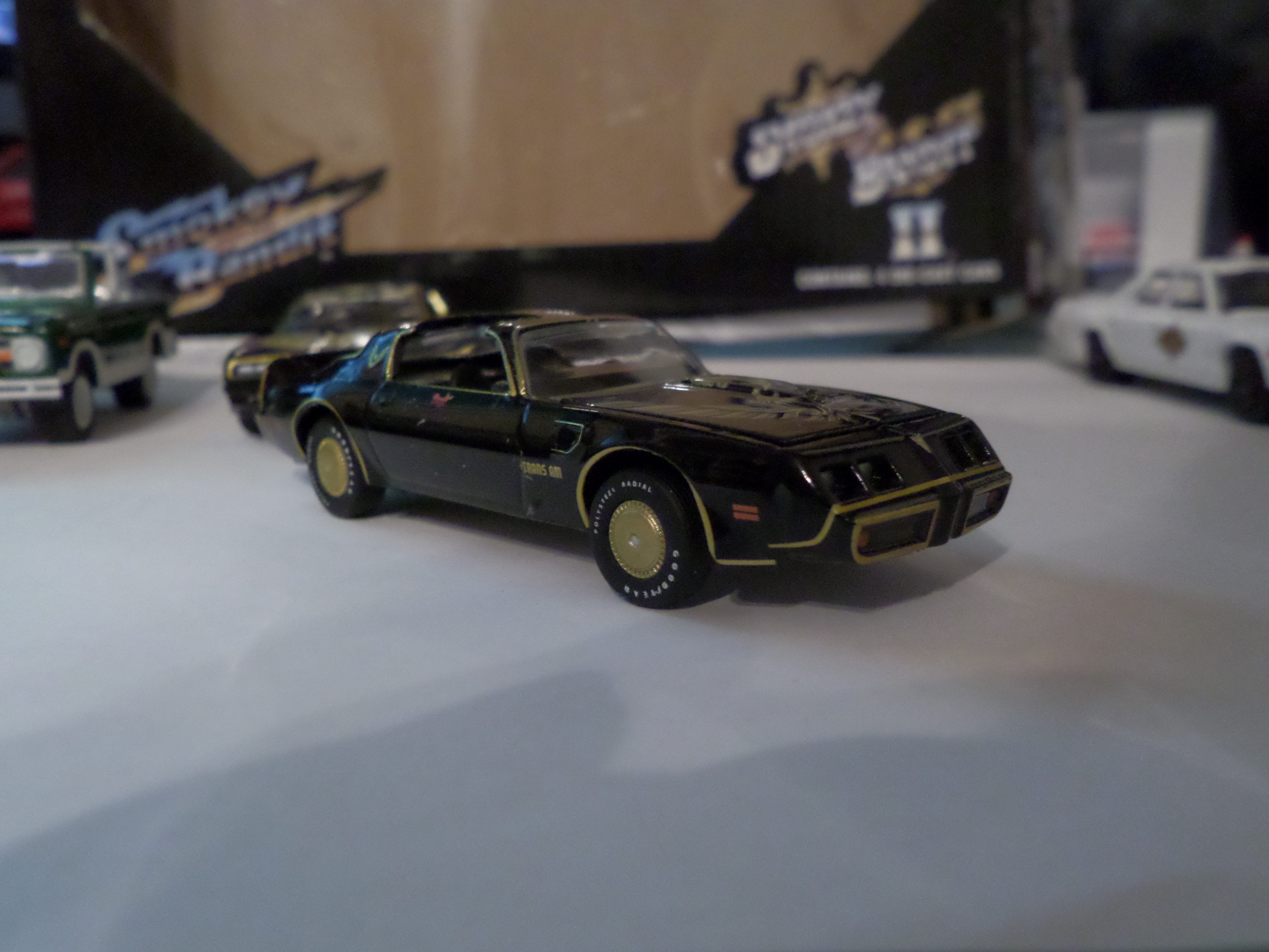 Smokey and a lot of Bandits: Greenlight Models' Smokey & The Bandit 4-car set - Bandit's spare Chicken; Pontiac Turbo Trans Am 1