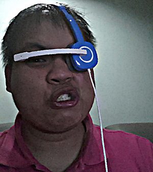 To pass the time, I took a picture of me looking like a fool, wearing my cheap-o headphones like a sci-fi villain.